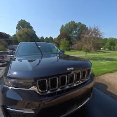 Black Jeep with a glossy finish after detailing