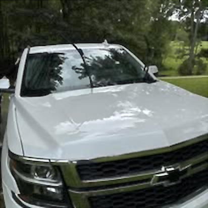 White Chevrolet SUV after an exterior detail